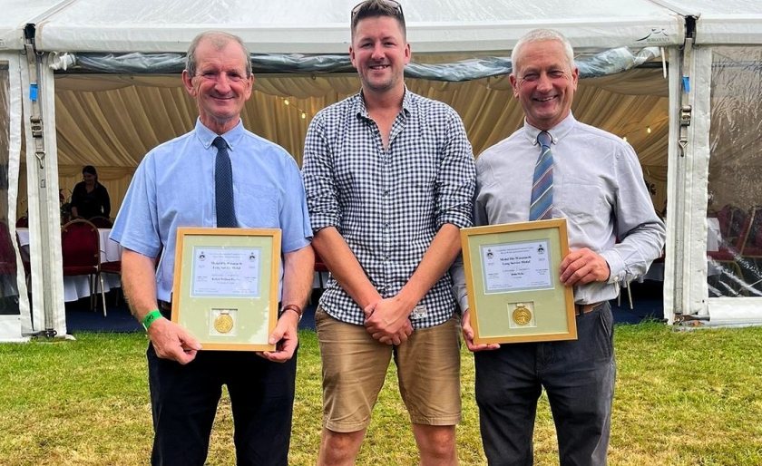 Rob and John (left to right) with their awards, and with estate farm manager Emyr Owen, from Llanrwst 