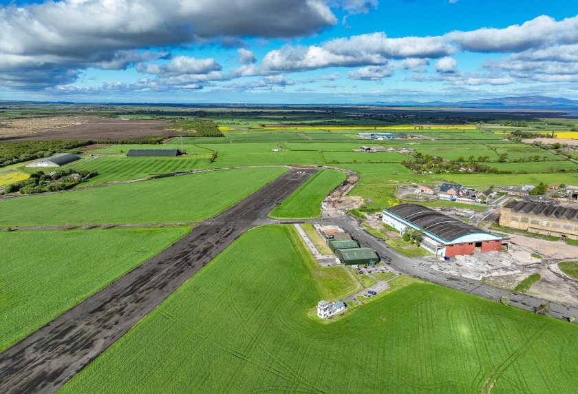 The 160.77-acre property includes surviving runways, a control tower, offices, a hangar and a helipad