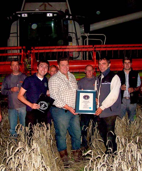 Record Breakers. Keith Challon (centre) and Kevin Yates receive the record certificate from Carlos Martinez of Guinness World Records (right).
